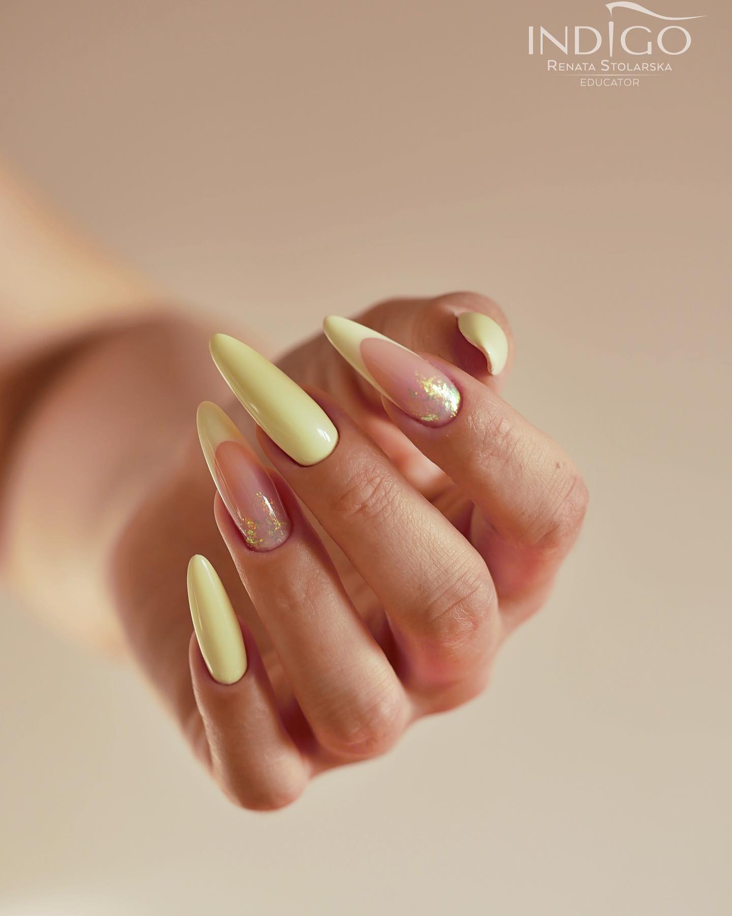 long Pastel Yellow nails with french Design