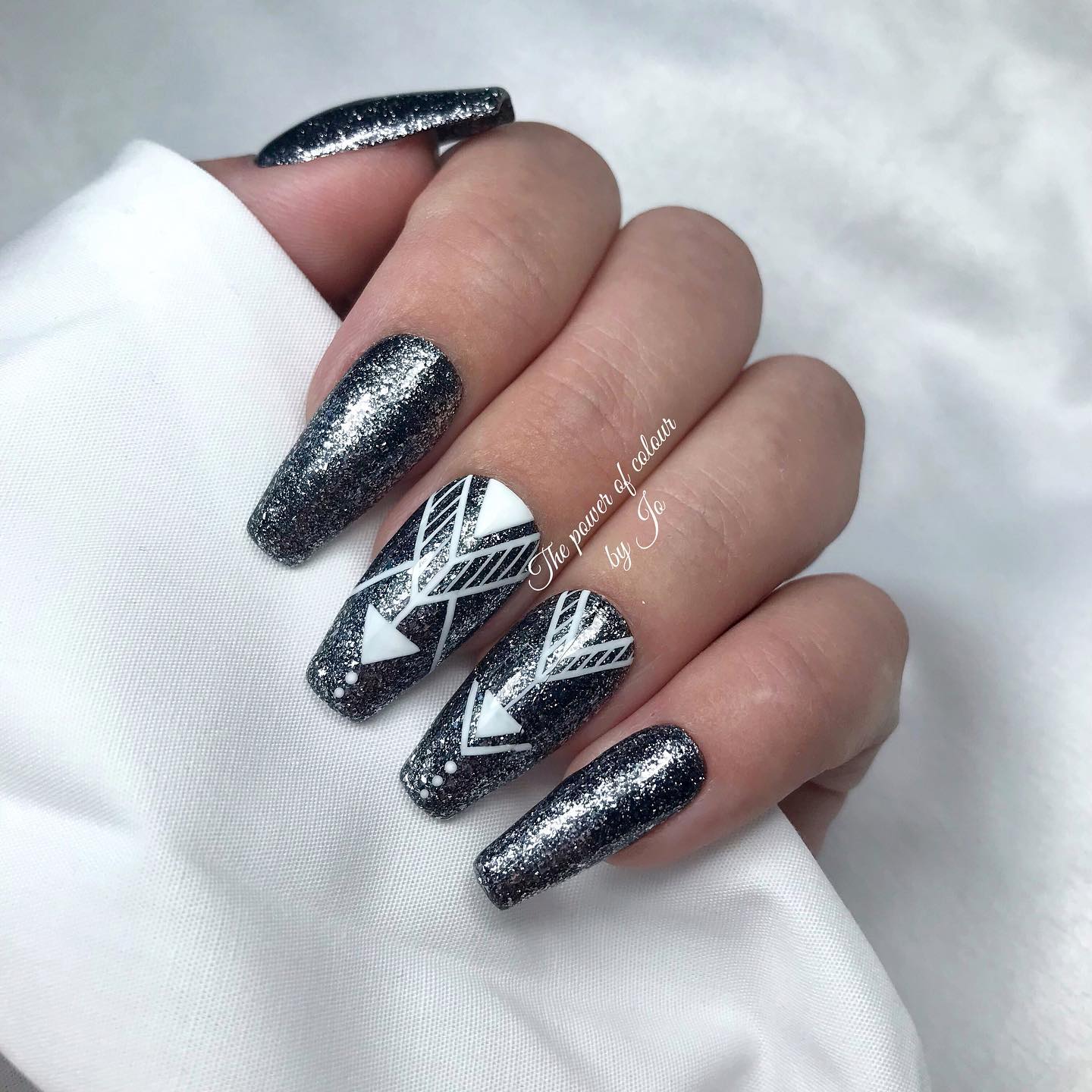Geometric Design on Black Coffin Nails
