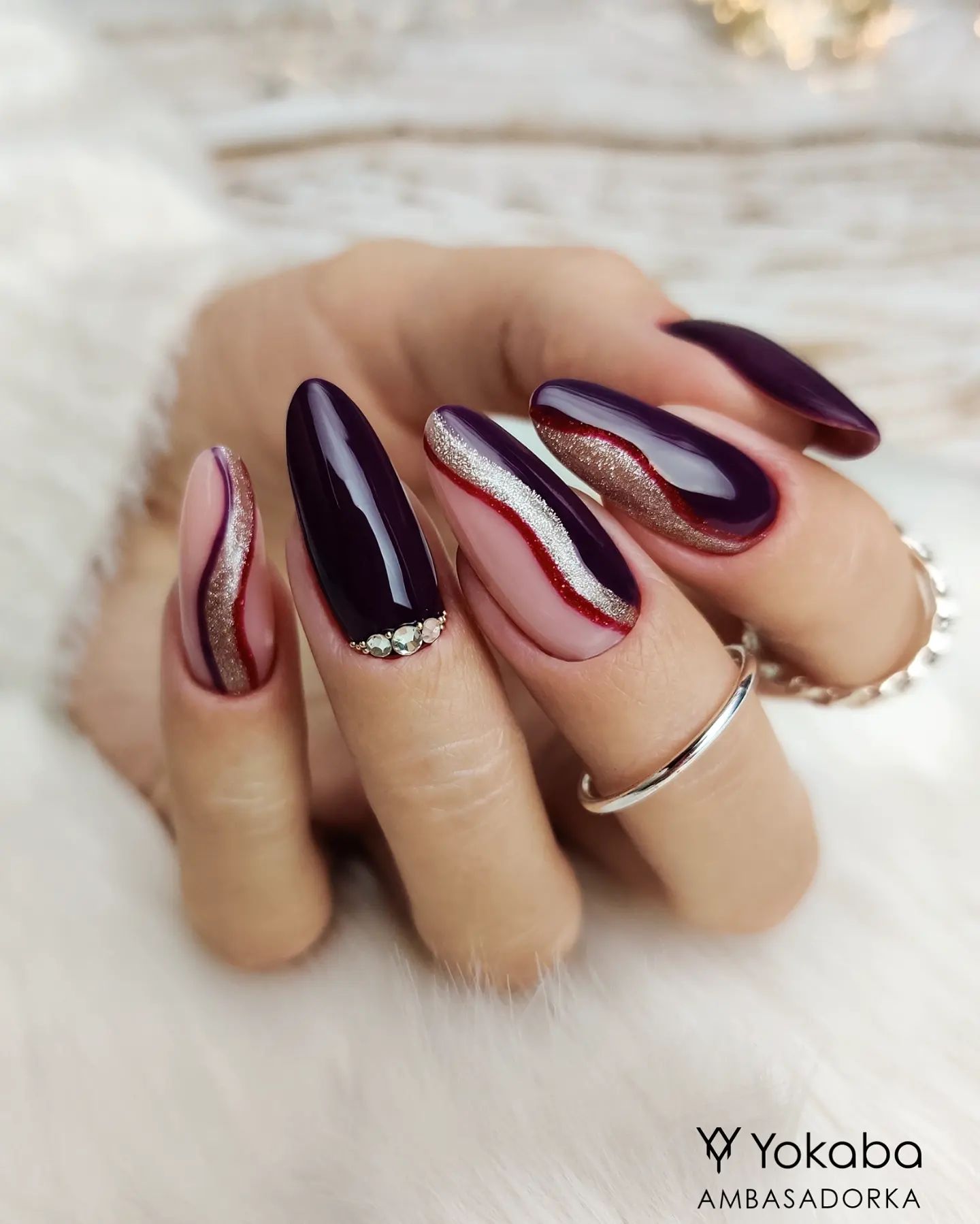 long burgundy Nails with Crystals and Silver Swirls