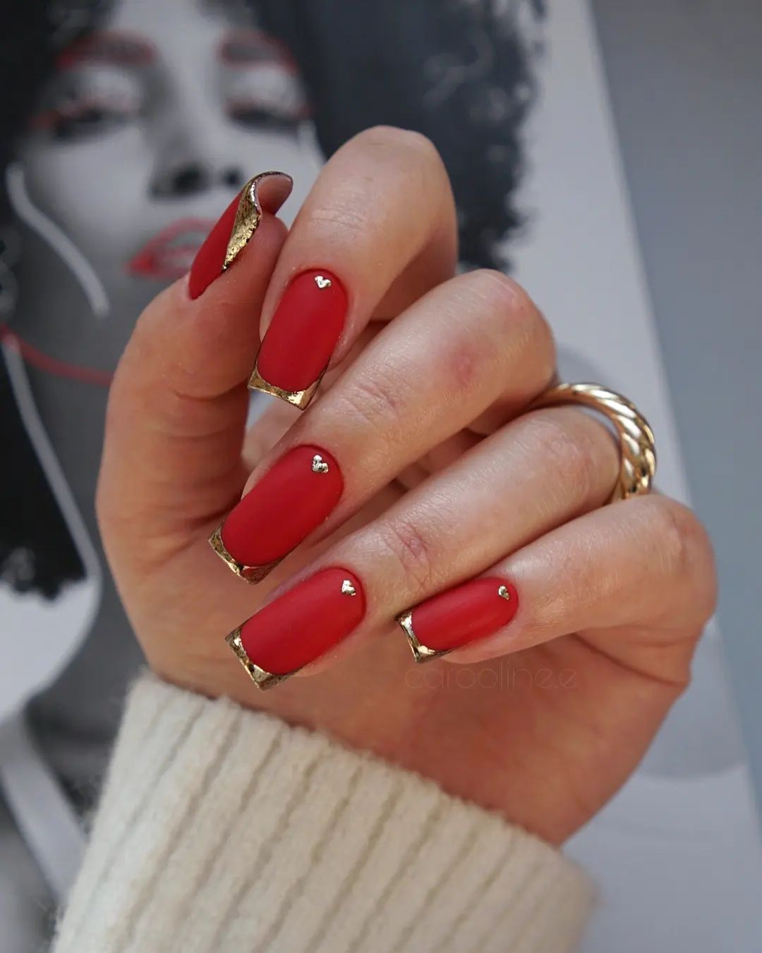 Red nails with gold Tips